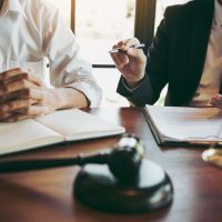 Lawyer explained to the client about the law that must be brought against the court case.||Lawyer explained to the client about the law that must be brought against the court case.